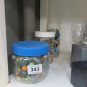 A large collection of old glass marbles
