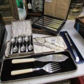 A mixed lot of cutlery including some with silver collars