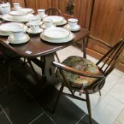 An Ercol table and 4 chairs