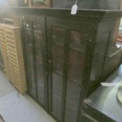 A glazed door bookcase