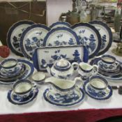 Approximately 25 pieces of blue and white dinnerware