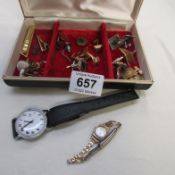 A mixed lot including watches, cuff links etc
