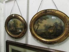 A pair of oval framed oil rural scenes, (one glass a/f)