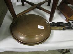 A copper warming pan