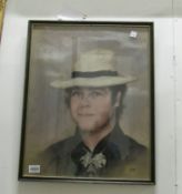 A pastel portrait of Elton John signed Lim '83