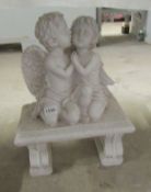 A garden figure being 2 cherubs