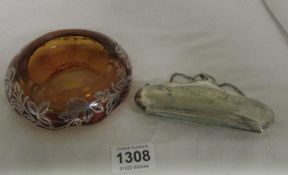 A silver overlaid amber glass ashtray and a silver plated purse