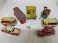 A quantity of playworn Dinky toys including milk floats, streamline fire engine etc