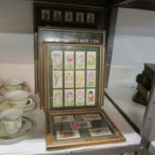 A quantity of framed theatrical, literary and sporting cigarette cards