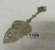 A Dutch silver impressed inn scene spoon with galleon top