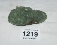 A carved jade paperweight