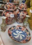 A pair of Oriental ginger jars, Pair of Oriental vases and plate
