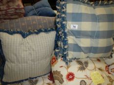 2 pairs of check patterned cushions