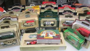 A mixed lot of boxed model vehicles including Lledo etc