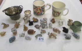 A mixed lot including Wade, commemorative, silver napkin ring etc