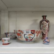 5 items of Oriental china including vases, bowls etc