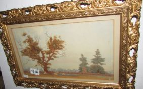 A gilt framed watercolour cattle in field