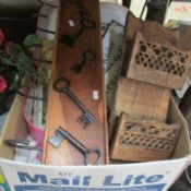 A box of wooden signs, key rack etc