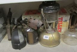 A Tilley lamp, 3 blow lamps etc