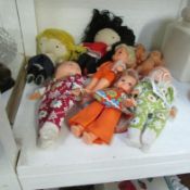 A mixed lot of 1950/60/70's dolls including two 3 faced dolls