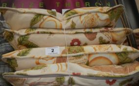 4 good quality floral patterned cushions
