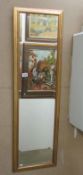 A gilt framed mirror