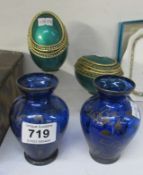 2 blue glass vases and 2 decorative eggs