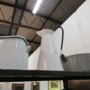 An enamel jug and bread bin and a jam pan