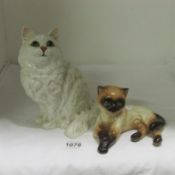 A Beswick cat and a Goebel cat