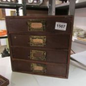 A small office chest containing  postcards