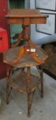 A bamboo table and a cane topped stool