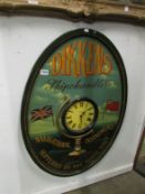 An oval advertising clock