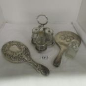 2 silver backed hand mirrors, a silver topped bottle and plated RAF cruet