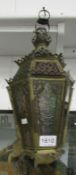 A brass and glass lantern