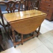 An oak gate leg table