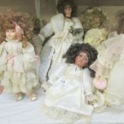 7 porcelain dolls