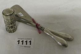 A silver pepper pot and silver handled shoe horn & button hook