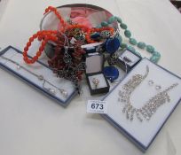 A mixed lot of costume jewellery including silver rings, necklaces etc
