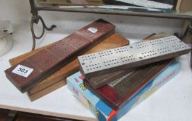4 cribbage boards and 2 other items