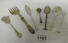 7 items of silver including spoons, cake fork etc