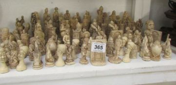 A large quantity of various chess pieces