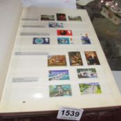 An album of GB stamps, mint and used