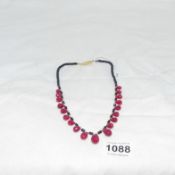 A 172ct African blue sapphire and ruby necklace