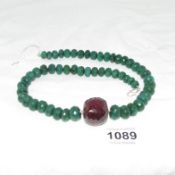 A 1000ct African emerald and ruby necklace