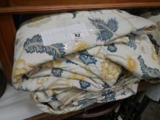 2 floral patterned quilts