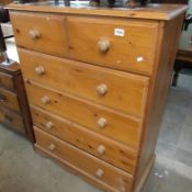A 2 over 4 pine chest of drawers
