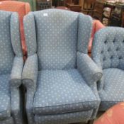 A blue wing armchair