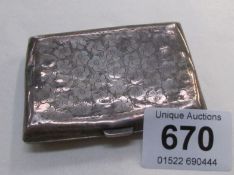 A silver cigarette case, Birmingham 1911, a/f