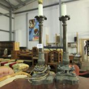 A pair of metal table lamps