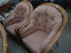 A pair of conservatory chairs